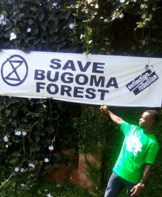 Sign reading "Save BugomaForest"